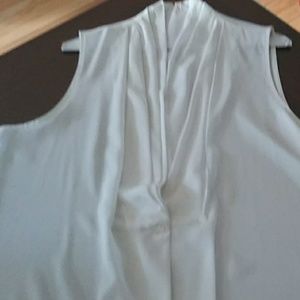 White sleeveless blouse